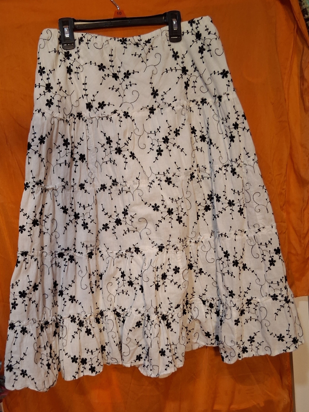 Tiered White Cotton A-Line Skirt with Black Floral Embroidery
